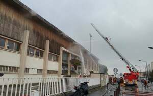 Incendie tribunes Delaune...